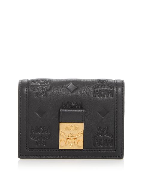 Find MCM Tracy Embossed Monogram Small Leather Wallet on Editorialist. Mcm Tracy Embossed Monogram Small Leather Wallet.Color:Black.Material:Polyurethane/polyester/cotton; trim: leather.Wallets.