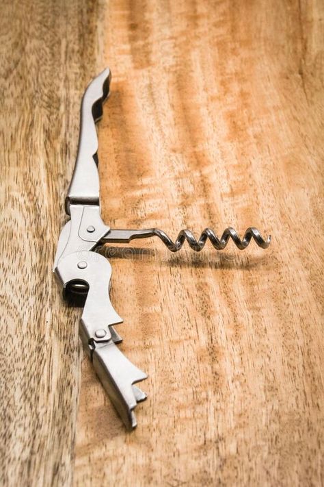 Fold out bottle opener and corkscrew stock images Wooden Board, Last Call, Bottle Opener, Photo Image, Stock Images, Stock Photos