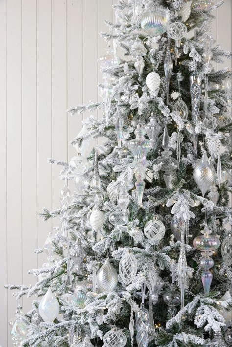 Xmas Tree White And Silver, White Crystal Christmas Tree, Irredescent Christmas Tree, Silver Pencil Christmas Tree, Snow Covered Christmas Tree, Silver Christmas Aesthetic, Silver Christmas Tree Ideas, Ice Christmas Tree, Christmas White Aesthetic