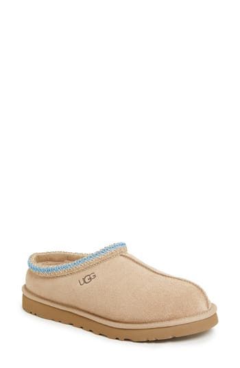 A top-quality suede upper is shaped over a light, flexible EVA sole for indoor or outdoor wear. A woven braid topline adds a nice detail. Slight dye transfer may occur with darker colors during first few wears Suede upper/genuine shearling and/or 100% wool lining/EVA sole Shearling may be sourced from Australia, Ireland, Spain, the UK or the USA. See packaging for confirmed country of origin UGGpure, a textile made entirely from wool to feel and wear like genuine shearling Imported Men's Shoes T Ugg Season, Little Boots, Cute Uggs, Cute Womens Shoes, Shoes For School, Ugg Tasman Slippers, Preppy Shoes, Pretty Shoes Sneakers, Ugg Tasman