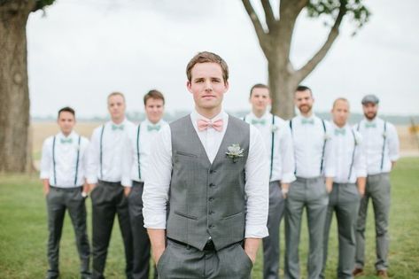 groom with pink bow tie...his groomsmen in teal Teal Groomsmen, Vest Groomsmen, Beach Wedding Groomsmen, Groom Suit Grey, Groomsmen Suspenders, Suits Groom, Groomsmen Grey, Casual Grooms, Grey Suits