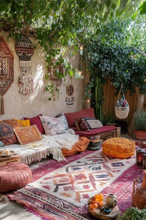 Create a laid-back bohemian outdoor lounge with cozy seating, colorful textiles, and hanging lanterns. Use a mix of floor cushions, poufs, and hammocks to make the space inviting. Incorporate plants, string lights, and eclectic decor for the ultimate boho retreat. 🌿✨ Bohemian Floor Cushions, Boho Deck Patio, Cozy Deck Ideas, Cozy Floor Seating, Boho Outdoor Space, Bed On The Floor, Bohemian Lounge, Boho Seating, Boho Textiles