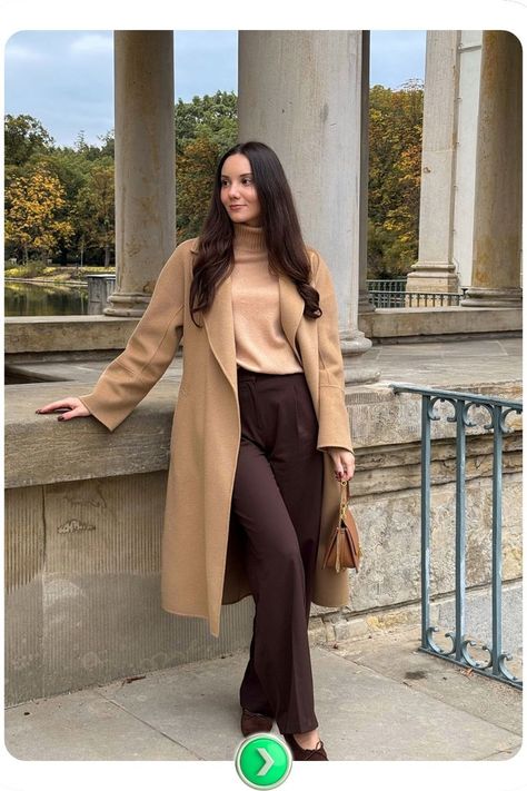 Camel coat with chocolate brown pants offers a timeless, sophisticated look, perfect for fall office days when you need both warmth and style in one ensemble. Camel Slacks Outfit Women, Dark Brown Dress Pants Outfit, Womens Brown Pants Outfits, Brown Pants Winter Outfit, Chocolate Outfit Ideas, Chocolate Brown Pants Outfit, Brown Dress Pants Outfit, Brown Pants Outfit For Work, Brown Pants Outfit Ideas