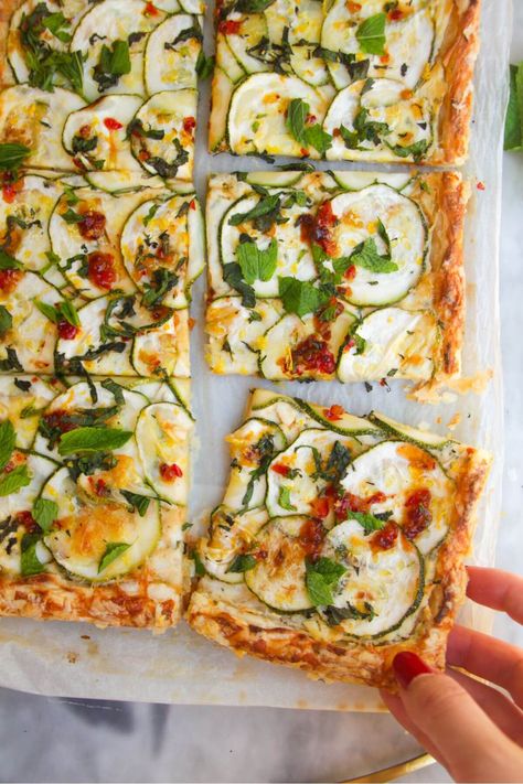 Celebrate zucchini season with this easy, speedy zucchini tart. Just slather a sheet of puff pastry with creamy Boursin cheese, top with sliced zucchini and bake until golden. A drizzle of sweet chilli jam makes it a very special picnic, barbecue or party snack idea. Appetizer Wreath, Christmas Sausage, Zucchini Tart, Roll Wreath, Easy Chilli, Grilled Broccoli, Fakeaway Recipes, Sausage Roll, Chilli Jam