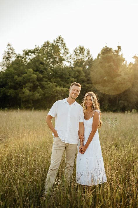 Engagement Pics In A Field, Informal Engagement Photos, Sundress Engagement Photos, Outfit Inspo Engagement Photos, Engagement Pose Ideas Photography, Engagement Clothing Ideas, Cute Simple Engagement Pictures, Engagement Photos August, Engagement Photos With White Dress