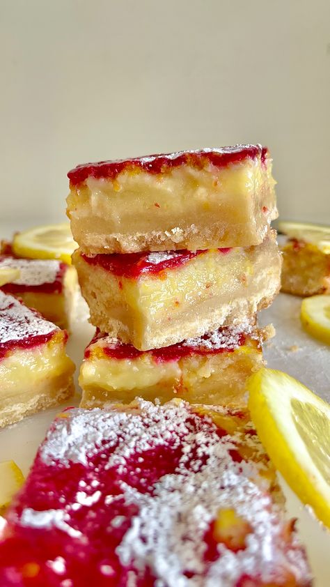 These tart and creamy Lemon Raspberry Bars have a buttery shortbread crust with a tangy lemon curd filling, baked with a thick raspberry compote on top. They are dusted with powdered sugar when done to complete the making of a perfect Spring snack! Rasberry Lemon Bars, Lemon Raspberry Bars, Lemon Curd Dessert, Raspberry Compote, Spring Snacks, Curd Filling, Raspberry Bars, Raspberry Desserts, Lemon Curd Filling