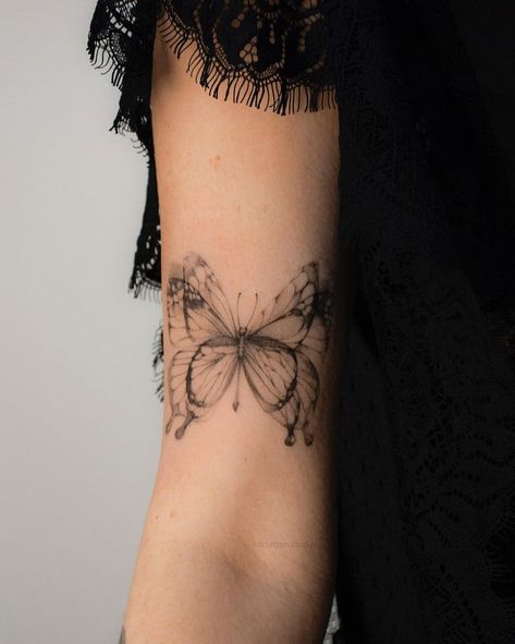 Delicate Butterfly Tattoos For Women, Back Of Arm Butterfly Tattoo, Confident Tattoo, Butterfly Tattoo Deep Meaning, Butterfly Meaning Tattoo For Women, Faded Butterfly Tattoo, Detailed Butterfly Tattoo, Butterfly Quote Tattoo, Sentimental Butterfly Tattoos