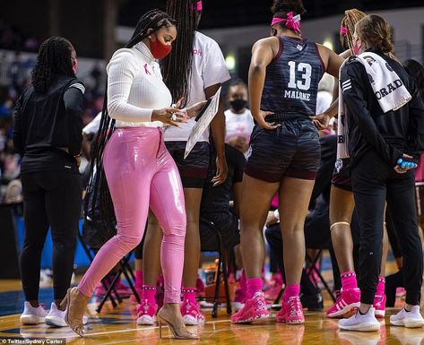 Texas A&M women's basketball assistant coach Sydney Carter, pictured on Sunday, hits back after facing backlash for wearing pink leather pants and stilettos to a game Basketball Coach Outfit, Sydney Carter, Basketball Game Outfit Women, All Black Outfits For Women, Basketball Game Outfit, Coach Carter, Coach Outfits, Nba Basketball Game, Game Outfit