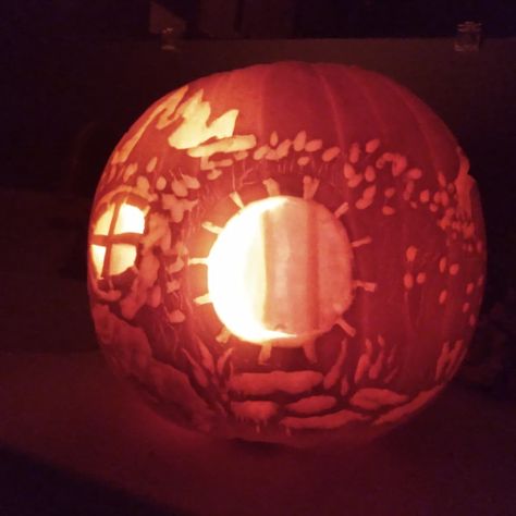 In a hole In the pumpkin there lived a hobbit... wait that's not right... Hobbit House Pumpkin Carving, Hobbit Hole Pumpkin Carving, Lord Of The Rings Jack O Lantern, Hobbit Hole Pumpkin, Hobbit Pumpkin Carving, Lotr Pumpkin Carving Ideas, Lotr Pumpkin, Hobbit Pumpkin, Pumpkin Carvings