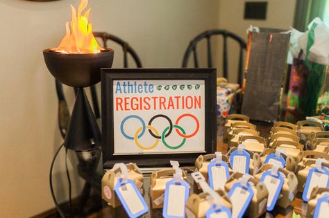 How To Throw An Amazing Olympic Party Olympic Party Food, Olympic Party Games, Beer Olympics Party, Olympic Party Decorations, Summer Olympics Party, Vbs Olympics, Office Olympics, Olympics Decorations, Olympic Theme Party