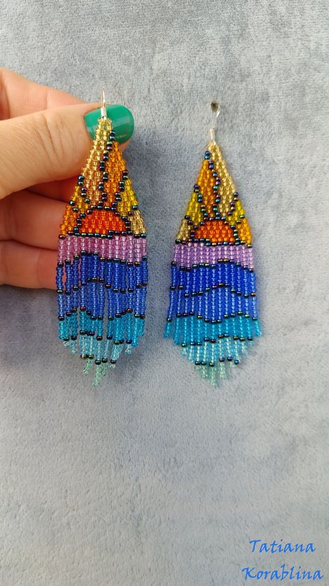 These handmade author's earrings are made of high-quality Czech beads and strong synthetic thread. In these unique earrings I use my author's scheme Stained glass. They are elegant, fashionable, and highly versatile, suitable for everyday wear. These bright and unique earrings will be an excellent and memorable gift for your family and friends: mothers, sisters, girlfriends, wives, daughters...  Copy without my permission is prohibited  For those who want to buy my copyright scheme for these ear Huichol Earrings, Stained Glass Earrings, Seed Bead Jewelry Patterns, Beaded Chandelier Earrings, Art Perle, Brick Stitch Earrings, Seed Bead Patterns, Beaded Crafts, Bead Pattern