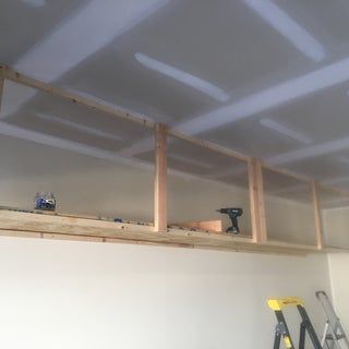 Wasted Space: High Garage Storage Shelves : 8 Steps (with Pictures) - Instructables Diy Overhead Garage Storage, Diy Storage Hacks, Hanging Garage Shelves, Garage Storage Plans, Easy Garage Storage, Garage Ceiling Storage, Garage Storage Inspiration, Garage Organisation, Diy Storage Shelves