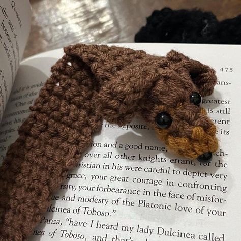 Dachshund crochet bookmark is a cute gift for a book reader📚 and dog lovers🦮🐾 (or both). Full pattern (PDF) available on bio. The Pattern is written in ENGLISH. It consists of 3 pages description of the crochet process and contains 8 process photos. Difficulty – beginner. The bookmark is 15 cm. Happy crocheting! #crochet #pattern #amigurumi #book #bookmark #read #doll #dachschund #dog #puppy Dachshund Crochet Bookmark, Crochet Dog Bookmark, Crochet Animal Bookmarks, Dachshund Crochet, Amigurumi Book, Crochet Dachshund, Book Bookmark, Bookmark Crochet, Crochet Bookmark