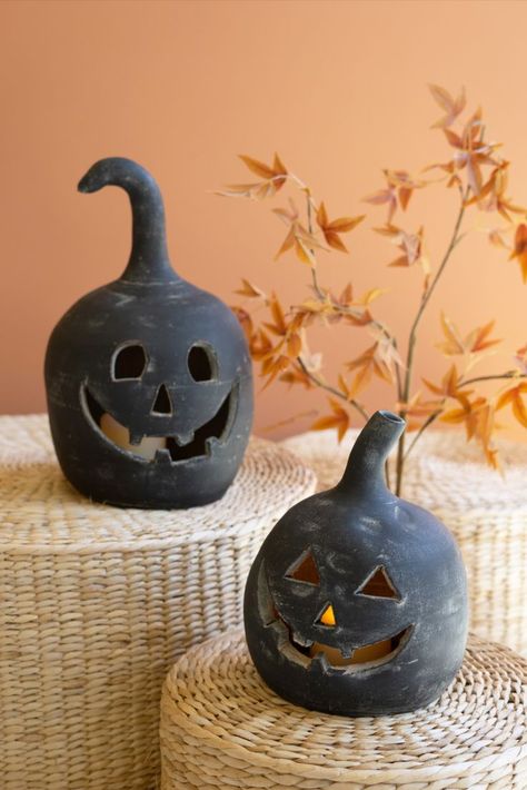 These 14.5"and 10" smiling jack-o-lanterns in black Honduras clay can be lit from within. Line your drive or perch them on your porch for a decorating treat. These fellows look extra striking arranged with orange and white pumpkins in spooky season. Set Of 2 Black Clay Jack-O-Lanterns H4433 Pottery Barn pumpkins dupe and DIY ideas and tricks. Urban outfitters Halloween decor ideas. Free people living Anthroliving Anthropologie home. Buyer Retailer Retail Wholesale To the Trade. Halloween Luminaries, Jack Lantern, Candle Luminaries, Lantern Candle Decor, Lantern Set, Black Clay, White Pumpkins, Halloween Home Decor, Lantern Candle Holders