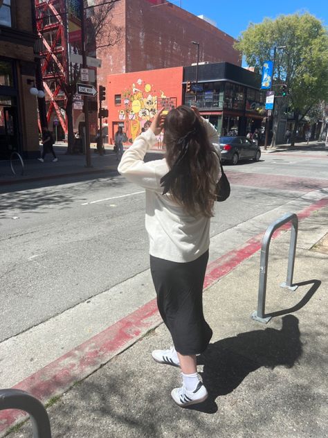 Women with long brown hair with long black dress cream sweater and white adidas sambas with bow socks Black Dress And Sneakers, Sambas White, Portugal Fits, Sambas Outfit, Dress And Sneakers, Sambas Adidas, Adidas Samba White, Adidas Outfits, Samba Dress