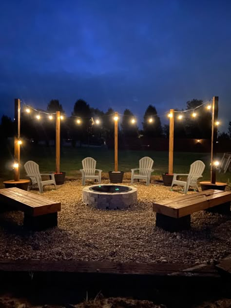 Stone Area In Backyard, Hanging Lights Around Fire Pit, Bon Fire Pit Ideas Backyards, Ideas For Fire Pit Area, Fire Pit Lights, Bonfire Pit Ideas Seating Areas, Fire Pit Planter, Back Yard Fire Pit Area, Railroad Ties Fire Pit