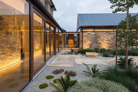 Robert Morris-Nunn, Architect redeployed the timbers and stones from an even older, tumbled-down barn to add two new wings to the rear of a “modest Georgian mansion” at Acton Park, just north of Hobart. Modern Barn House, Modern Farmhouse Exterior, Architecture Awards, Stone Walls, Barn Style House, Modern Barn, Farmhouse Exterior, House Extensions, Barn Style