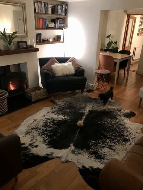 Nguni Hide Living Rooms, Cow Rugs Living Room, Cow Hyde Living Room Decor, Cow Hide Rug Living Room, Cow Rug Living Room, Hide Rug Living Room, Dark Couch Living Room, Edwardian Living Room, Couch Aesthetic