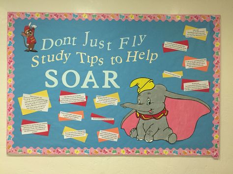 Dumbo themed board Disneyland Bulletin Board, Dumbo Bulletin Board, Disney Theme School Hallway, Dumbo Room Decor, Disney Dumbo Backdrop, Circus Vbs, School Wide Themes, Homecoming Decorations, Teacher Themes