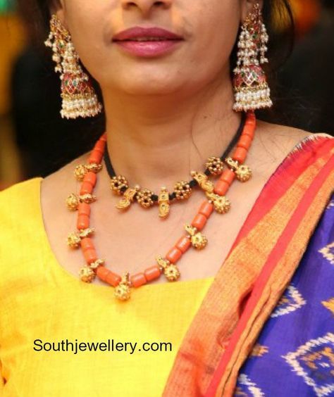 Traditional black thread choker ,  coral beads necklace and guttapusalu jhumkas.  Black dori necklace models, south indian traditional jewellery designs, gold necklace models, indian jewellery designs Pinky Reddy, Thread Choker, Coral Jewelry Set, Coral Beads Necklace, Gold Jewelry Simple Necklace, Beaded Necklace Designs, Mangalsutra Designs, Indian Jewellery Design, Black Beaded Jewelry