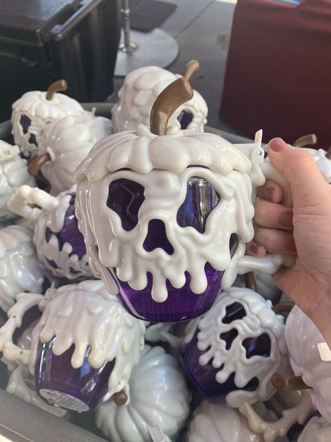 Disney Is Selling A Purple Version Of Their Popular Poison Apple Mug For HalloweenDelish Poison Apple Diy, Poison Apple Aesthetic, Poison Apple Mug, Snow White Poison Apple, Flamingo Balloons, Apple Whiskey, Poisoned Apple, Apple Cup, Halloween Tricks