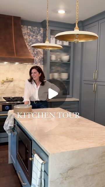 Cortney LaCorte | Kitchen Details ✨

Design: @ingacasha 
Appliances: @bluestarcooking 48” Range & double oven, Antique Copper hood and Built in Fridge
... | Instagram Taj Mahal Quartzite Countertops With Backsplash, Taj Mahal Kitchen, Taj Mahal Countertops, Taj Mahal Quartzite Kitchen, Etsy Lighting, Kitchens 2023, Taj Mahal Quartzite Countertops, Built In Fridge, Kitchen Sink Window