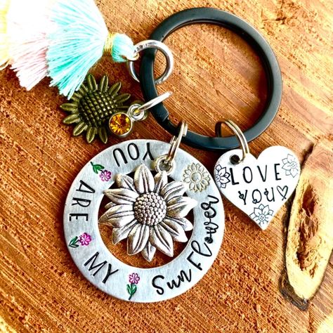 Hand Stamped “You Are My Sunflower” Keychain! Perfect Sunflower Lover Gift! It Can Be Personalized With A Hand Stamped Initial Or Name Tag (Option Available At Checkout)! 1.25” Aluminum Washer Blank - Sunflower Charm And 3 Layer Tassel! - 1.5” Yellow Coated Keyring (This Option Doesn't Come With The Mini Love You Tag For More Lauren Brooke Shop Products Check Out My Website: Www.Laurenbrookeshop.Com Sunflower Keychain, My Sunflower, Sunflower Charm, Sunflower Colors, Mini Love, Hand Stamped Keychain, Yellow Coat, Bracelet Ideas, Stamped Jewelry