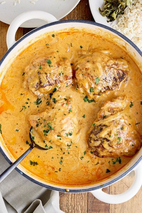 Best Smothered Chicken recipe where chicken thighs are coated in seasoned flour and sauteed, then cooked in a rich and creamy onion gravy. Cooking For My Soul, Smothered Bone In Chicken Thigh Recipes, Chicken Thigh Recipes Smothered, Smother Me Chicken, Bone And Skin Chicken Thigh Recipes, Smothered Chicken With Mashed Potatoes, Smothered Chicken Crockpot Recipes, Boneless Chicken Thigh Dutch Oven Recipes, Buttermilk Sauce Chicken