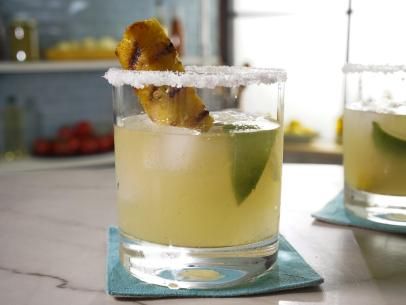 Grilled Pineapple Mezcal Margarita Grilled Pineapple Mezcal Margarita, Grilled Pineapple Margarita, Pineapple Mezcal Margarita, Cherry Cola Cake, Margaritas Recipes, Manly Cocktails, Margarita Mix Drinks, Cookout Dishes, Katie Lee Biegel