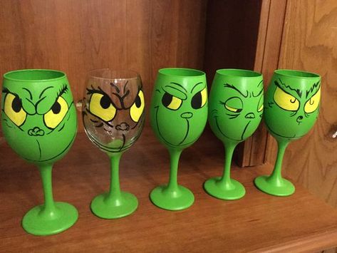 Every wine glass is hand painted with the assistance of my 7 year old son. All wine glasses are dishwasher safe. They are 20 ounce glasses. These are painted with four different faces of Mr. Mean of Christmas. Please choose the face you would prefer when purchasing. Every order is completed within 2 business days. All wine glasses are shipped by USPS First Class that will take approximately 2-3 business days to arrive. Thank you for your interest and purchase of my wine glasses. Wine Glass Christmas Crafts, Wine Glasses Christmas, Cactus Craft, Christmas Wine Glasses, Christmas Glasses, Wine Glass Crafts, Mason Jar Crafts Diy, Meaning Of Christmas, Painted Wine Glasses