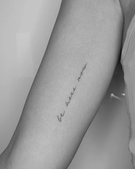 be here now Minimalist Script Tattoo, Text Tattoo Arm, Tattoo Word Fonts, Script Tattoos, Wörter Tattoos, Tattoo Fonts Cursive, Script Tattoo, Cursive Tattoos, Writing Tattoos