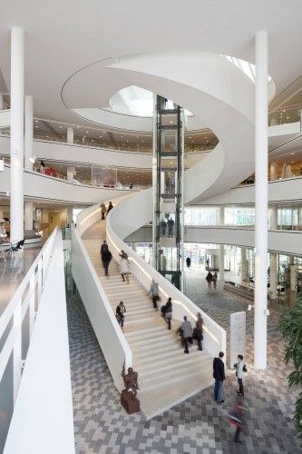 Spiral staircase that doesn't inhibit your view and is incorporated into the atrium/public area.  designed by 3XN and the building is Stadshuis Nieuwegein 3xn Architects, Escalier Design, Stairs Architecture, Cultural Centre, Sunset Strip, Spiral Stairs, Architecture Magazines, Cultural Architecture, Spiral Staircase