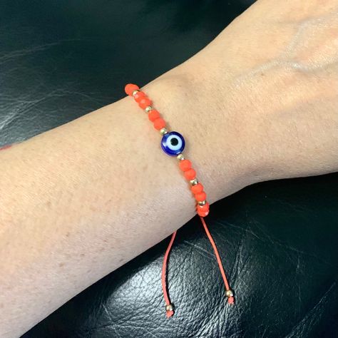 ❤️ Evil Eye Bracelet, Orange Adjustable Cord Bracelet, Protection/friendship/Good Luck/Wish/ Beaded Bracelet, Birthday Gift, Turkish Jewellery ❤️ Many colours are available ❤️ Size: Adjustable  ❤️ Material: Cotton string, Beads ❤️ Lovely Gift for loved one or perfect to treat yourself  ❤️ Many Evil Eye Jewelleries are available, buy any 3 items or more and get 10% Discount  ❤️ Items are posted by Royal Mail ( Free Shipping ) ❤️ If you have any questions please do not hesitate to contact me :) ⭐️ Orange Evil Eye Bracelet, Handmade Red Evil Eye Bracelet For Gift, Handmade Red Evil Eye Bracelet For Good Luck, Red Resizable Evil Eye Bracelet, Adjustable Cord Bracelet, Good Luck Wishes, Adjustable Red Evil Eye Bracelet, Hand-strung, Turkish Jewellery, Good Luck Bracelet