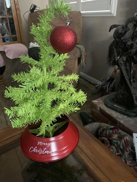 Dollar Tree crafts & DIY With Instructions | All you need to make a Grinch Christmas Tree is one white dollar tree 🌲 from the dollar store the red base also from the dollar store and spray pai... | Facebook The Grinch Christmas Tree Diy, Grinch Tree Diy, Grinch Christmas Tree Diy, Dollar Tree Grinch, Dollar Tree Grinch Ideas, Diy Grinch Tree, A Grinch Christmas, Make A Grinch, Dollar Tree Crafts Diy