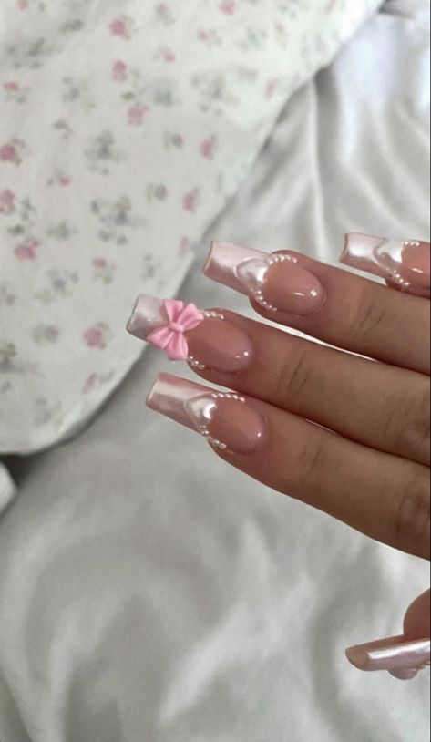 these are soft pink acrylic french nails, perfect for your aesthetic Nail Designs With Bow Charms, Nails With Bows Rhinestones, Pink Bow Valentines Nails, Pink Nails Ideas Coquette, Acrylic Nails Bow Charm, Pink Nails Princess, Christmas Bow Nails Acrylic, Nail Inspo Coffin Charms, Light Pink Nails Y2k