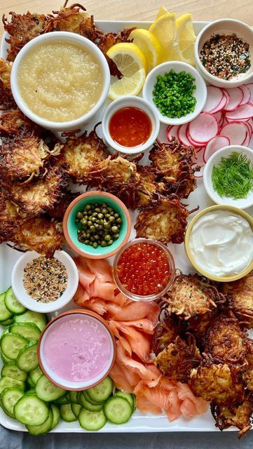 The Kitchn on Instagram: "Our Hanukkah plans? Making this latke board 😍😋 It’s a super fun and easy to celebrate the holiday that EVERYONE will love! Get @byrachelp’s latke tips and find out what’s not on her board at the link in bio! #thekitchn #hanukkah #latkes #latkeboard #latke #holidayhosting #holidayseason #holidayparty #holidayvibes" Hanukkah Dinner Party, Hannukah Dinner Ideas, Latke Board, Chanukah Dinner, Hanukkah Party Ideas, Chrismukkah Party, Hanukkah Party Food, Hanukkah Aesthetic, Chanukah Recipes