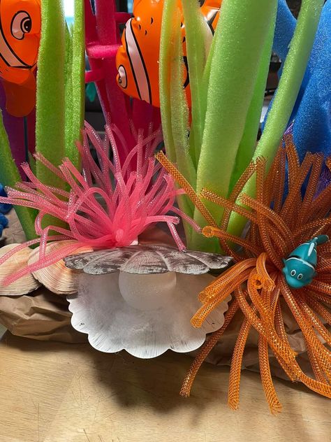 Fake Seaweed Diy, Foam Coral Reef Diy, Coral Reef With Pool Noodles, Seaweed Diy, Making Coral Reef From Pool Noodles, Anemone Costume, Fake Seaweed, Coral Craft, Book Fair Ideas Display