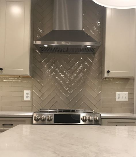 Subway Tile Herring Bone Pattern at Range Hood Herring Bone Tile Backsplash, Range Hood Backsplash Ideas, Tile Behind Range, Hood Backsplash, Kraftmaid Kitchens, Black Subway Tiles, Range Tile, Kitchen 2023, Bone Pattern