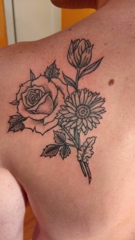 rose, gerber daisy, and tulip tattoo Tulip Rose Tattoo, Sunflower Rose Tulip Tattoo, Tulip Rose Daisy Tattoo, Tulip And Rose Tattoo, Rose And Daisy Tattoo, Daisy And Rose Tattoo, Gardenia Tattoo, Flower Bouquet Tattoo, Tulip Drawing