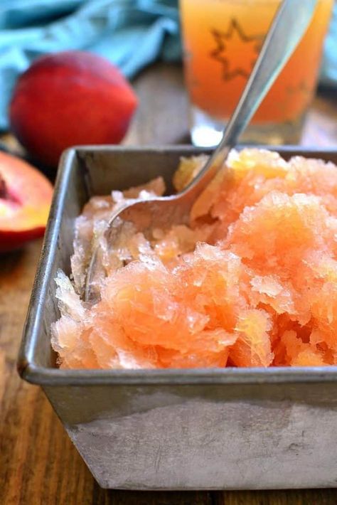 This Frozen Peach Slush is a delicious blend of citrus, peach tea, peach schnapps, and brandy...topped off with your favorite sparkling soda! Perfect for parties, special occasions, or lazy summer days. The perfect drink for summer! Peach Slush, Alcoholic Slush Recipes, Alcoholic Slush, Brandy Slush, Drink For Summer, Lemon Tree Dwelling, Peach Whiskey, Slush Recipes, Cocktail Gin