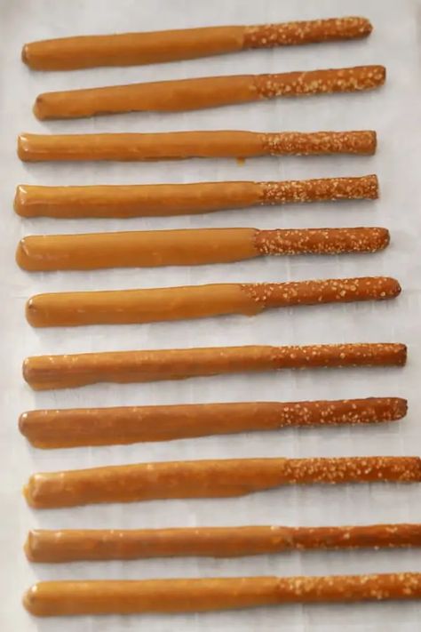 Caramel Chocolate Covered Pretzel Rods, Caramel Pretzel Sticks, Chocolate Caramel Covered Pretzels, Caramel Chocolate Dipped Pretzel Rods, Halloween Pretzel Rods Chocolate Covered, Carmel Chocolate Dipped Pretzel Rods, Carmel Dipped Pretzel Rods, Caramel And Chocolate Dipped Pretzels, Caramel Dipped Pretzel Rods