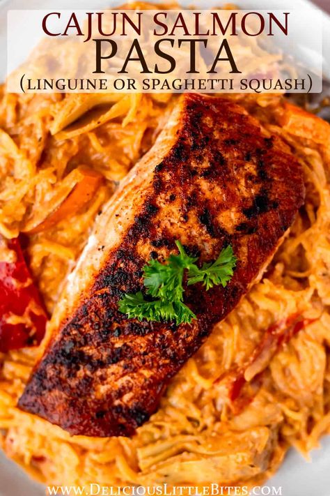 Cajun Salmon Pasta made with blackened salmon, red peppers and artichokes is a quick and easy, incredibly flavorful dinner recipe. It's perfect for any night or the week or even for entertaining guests. This recipe is served with spaghetti squash making it gluten free and low carb, but instructions are also included for serving it over linguine. | #salmon #cajunsalmonpasta #pasta #cajun #recipe Salmon Spaghetti Squash, Cajun Pasta With Salmon, Salmon And Spaghetti Squash, Salmon Marinara Pasta, Cajun Spaghetti Squash, Spaghetti Squash Salmon Recipes, Spaghetti Squash With Salmon, Spaghetti Squash And Salmon, Spicy Salmon Pasta