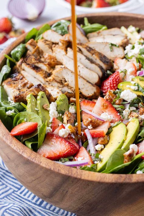 This Strawberry Spinach Salad with Grilled Chicken is one of those dishes that hits every tastebud in your mouth! Juicy fresh strawberries, creamy avocado, salty feta cheese crumbles, sweet candied pecans, and a tangy homemade balsamic dressing are all balanced out with some protein-packed grilled chicken. It will no doubt be the talk of the town at your next summer BBQ or get-together. Homemade Balsamic Dressing, Spinach Salad With Chicken, Salad With Grilled Chicken, Strawberry Spinach Salad, Mediterranean Couscous, Goat Cheese Stuffed Chicken, Salad With Chicken, Orzo Pasta Salad, Watermelon Feta Salad