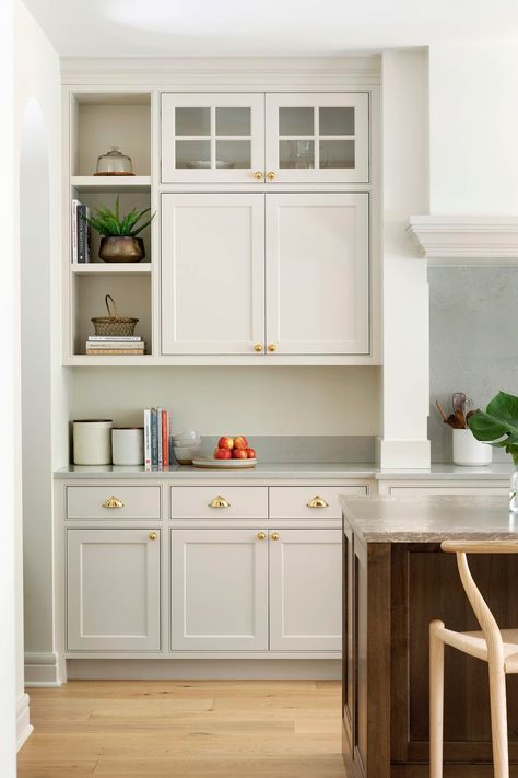 Inset custom cabinetry with brass cabinet hardware, open shelves, and light gray quartz countertops. Sherwin Williams Limewash, Jkath Design, Cabinetry Colors, Cabinet Trends, Inset Cabinetry, Kitchen Cabinet Trends, Cabinet Door Styles, Cabinet Paint Colors, Painted Kitchen