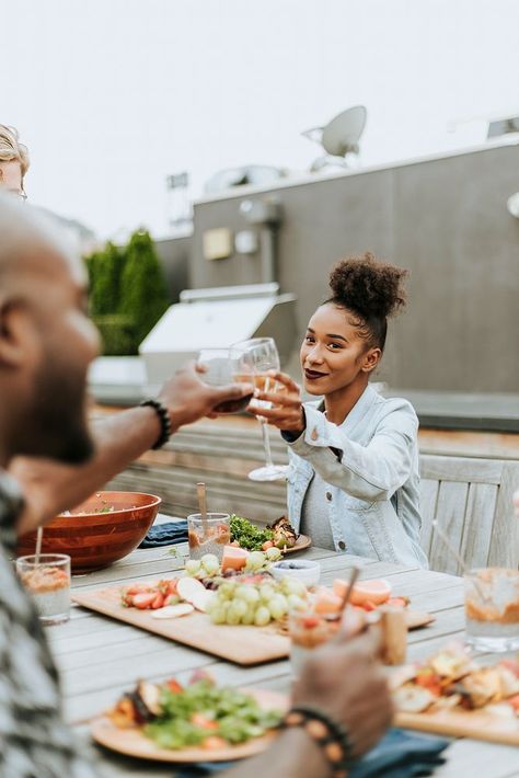 Friends clinking wine glasses at a rooftop party | premium image by rawpixel.com / McKinsey Learning To Cook, Black Joy, Online Cooking Classes, Rooftop Party, Wine Photography, Restaurant Photography, The Everygirl, Birthday Photography, My Black