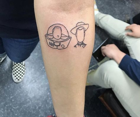 Simple Toy Story Tattoo, Woody And Buzz Tattoo Best Friends, Buzz And Woody Tattoo, Lego Tattoo, Toy Story Tattoo, Deer Skull Tattoos, Story Tattoo, Moth Tattoo Design, Tiny Wrist Tattoos