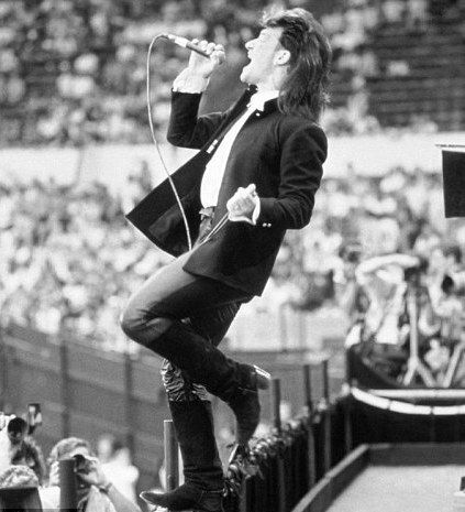 Bono at the Live Aid during "Bad" in 1985 U2 The Unforgettable Fire, Live Aid 1985, U2 Band, Paul Hewson, Loud People, Larry Mullen Jr, Bono U2, Live Aid, 80s Bands