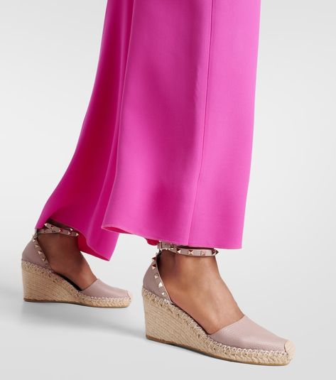 Rockstud Double leather wedge espadrilles in pink - Valentino Garavani | Mytheresa Valentino Garavani Shoes, Espadrilles Style, Wedge Espadrilles, Metallic Fabric, Evening Shoes, Powder Pink, Leather Wedges, Espadrille Shoes, Valentino Garavani