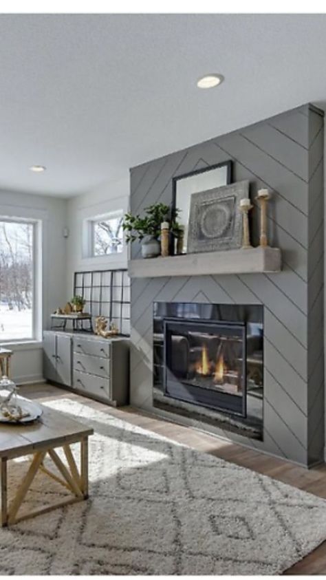 Chevron shiplap fireplace in soft gray  with rustic mantel is the showstopper in this farmhouse living room Farmhouse Fireplace Ideas, Modern Farmhouse Fireplace, Design Camino, Shiplap Fireplace, Farmhouse Fireplace, Fireplace Remodel, Diy Fireplace, Home Fireplace, Fireplace Ideas