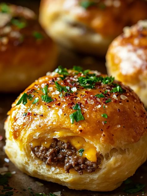 **Garlic Parmesan Cheeseburger Bombs Recipe – A Cheesy Delight You Can't Resist!** - Sanepe Recipes Cheeseburger Pockets Biscuits, Cheeseburger Appetizer Bites, Crescent Hamburger Recipes, Steak And Cheese Bites, Game Day Food Recipes, Disney Parks Food Recipes, Cheeseburger Bites Appetizers, Ground Beef Hors D’oeuvres, Garlic Parm Cheeseburger Bites